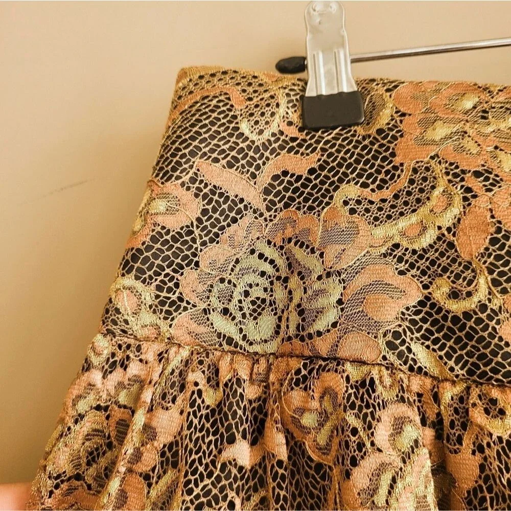 Trina Turk Lace Overlay Skirt 🌸Designer: Trina Turk – known for bold prints,
